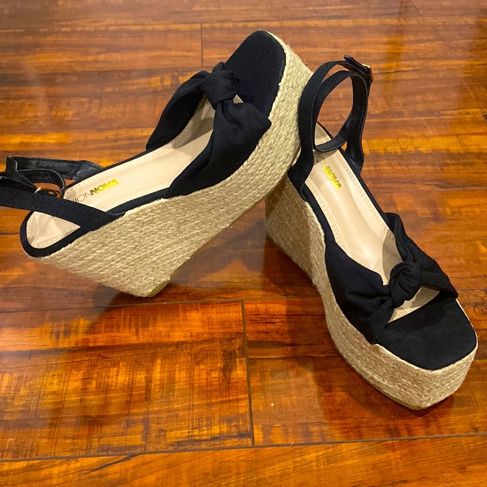 Fashion NOVA black platform wedges. Size: 6